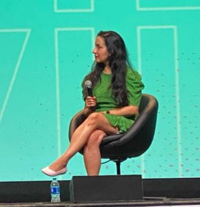 Paula at Podcast movement, wearing Rothy's